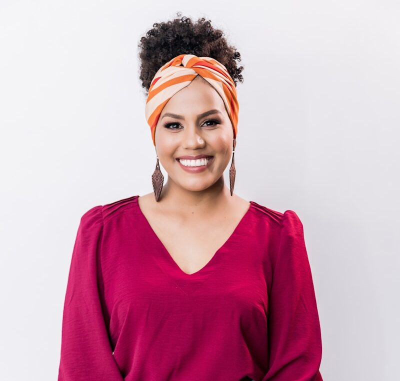 woman in red v neck long sleeve shirt